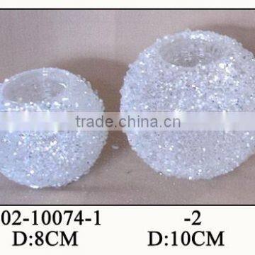 white glittering glass round tealight holders