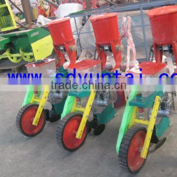 three row corn planter with fertilizer spreader