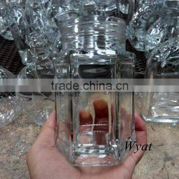 wholesale hexagonal shape glass honey jars manufacturer