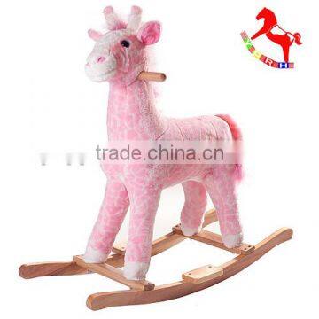 playful plush rocking horse pink penny the Giraffe with sound on wooden base