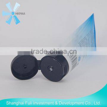 Plastic cosmetic tube with flip-top tube