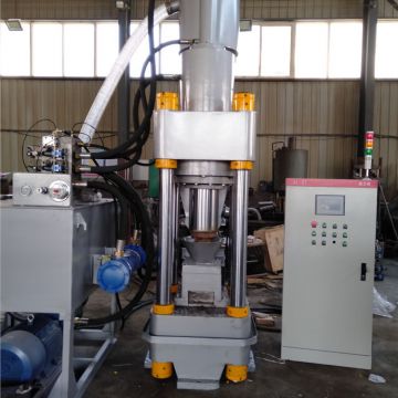 Scrap metal briquetting machine