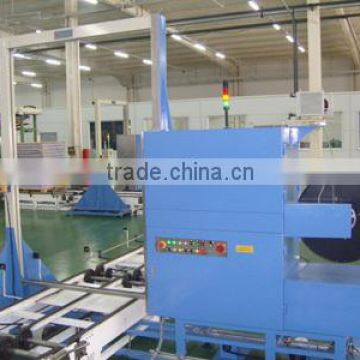 Automatic through Arrow pallet strapping packer