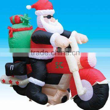 Christmas santa on motorcycle outdoor