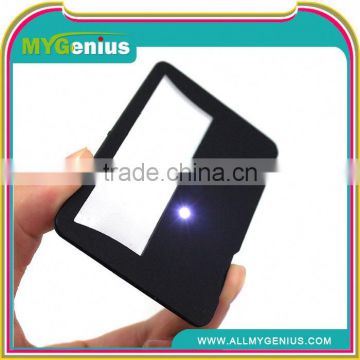 Credit card magnifier with LED