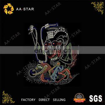 A skull driving a harley rhinestone transfer iron on clothing