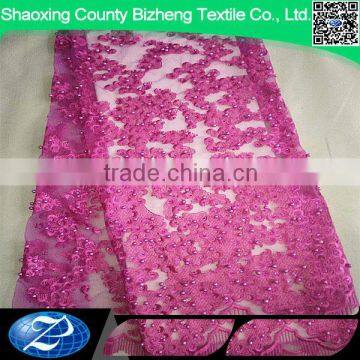 Nice style african beaded french guipure tulle lace fabric for wedding dress                        
                                                                                Supplier's Choice