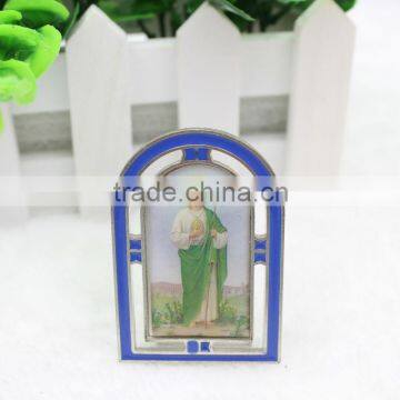 Small icon with metal holder