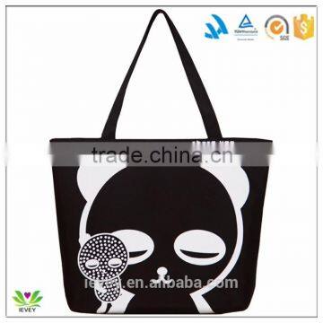 dyed black cotton shopping bag with white deisgn