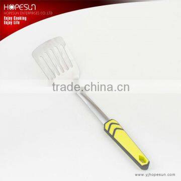 Popular mirror finished stainless steel slotted turner with hanger                        
                                                                                Supplier's Choice