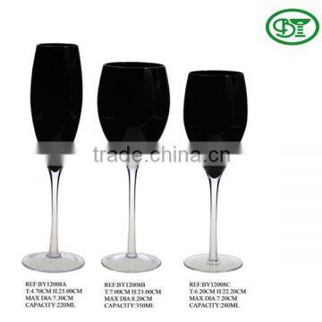 black wine glass with clear stem