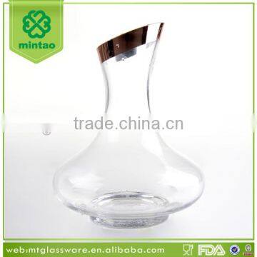 hand blown round glass wine decanter with gold rim