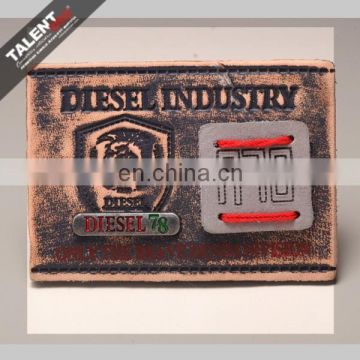 Free design fashion logo customized special metal real leather badge patch for jeans