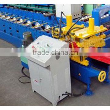 Sheet corrugated forming machine and decoiler / roller