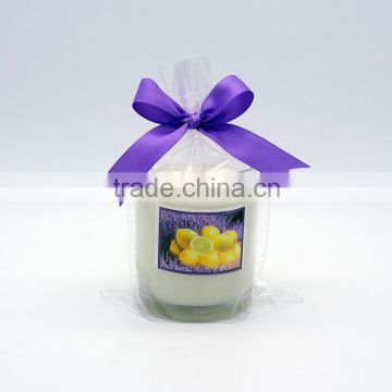 glass candle jar with color ribbon