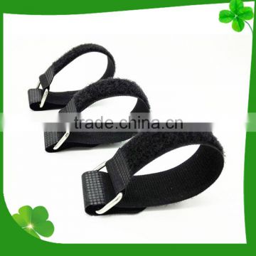 Hook and loop strap with buckle