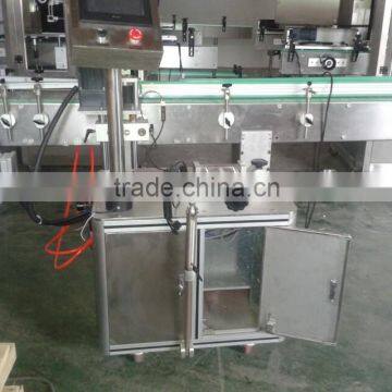 Automatic self-adhesive bottle labeling machine