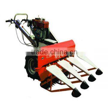 Hand held mini wheat and rice harvesting machine