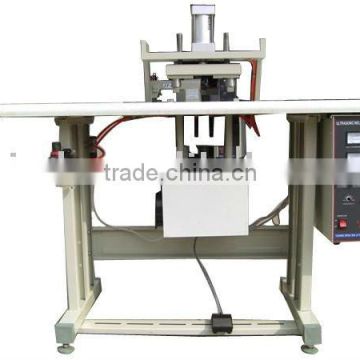 Double head ultrasonic-controlled handle loop fixing/bag making machine