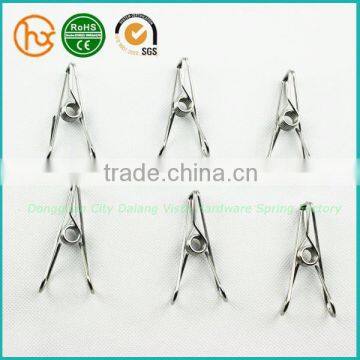 Spring clip button