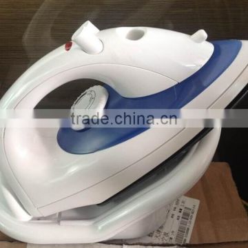 Cordless dry steam and spray iron with stainless steel soleplate