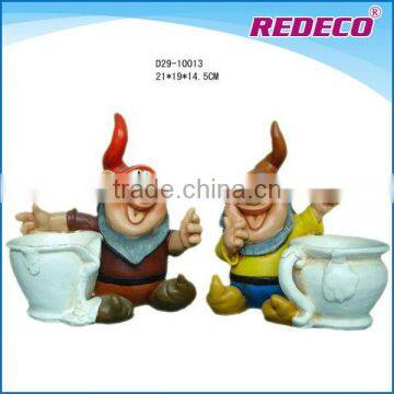 Resin garden gnome with flower pot for sale