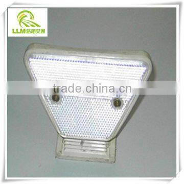 Direct manufacture flexible trapezoidal attached reflective delineator for guardrail