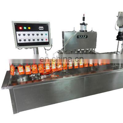 pineapple juice pop melon seed standing up with spout satchet/pouch/bag filling sealing capping packaging machine