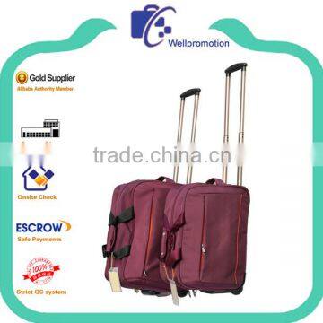 Wholesale polyester soft luggage trolley bag with casters