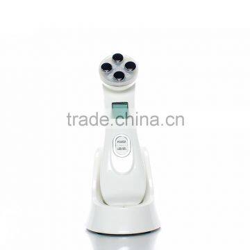 Girl use anti aging microcurrent machine face lift cream