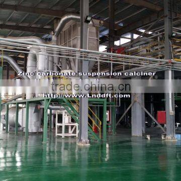 Zinc carbonate pyrolysis into active zinc oxide