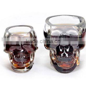 Colored skull glass candle jar