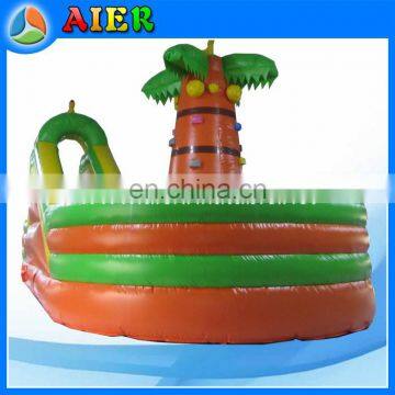 Palm tree inflatable playground with climbing mountain