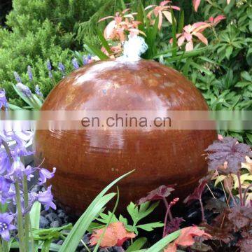 45cm Antique corten steel sphere water feature with pebble pool