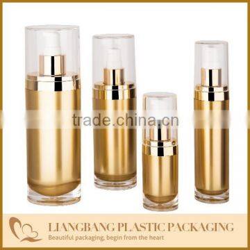 2015 cosmetic packaging lotion bottle withGold bottle with acylic and pump