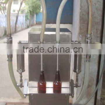 Semi Automatic Two Head Volumetric Liquid Filling Machine