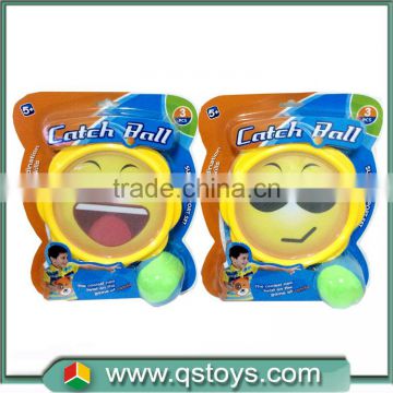 Emoji smiley face stick catch ball racket toy