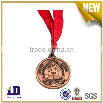Antique gold award metal sport medal with ribbon