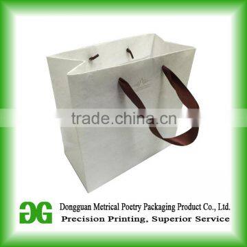Pretty colored paper bags with handles/rope handle paper bags in China
