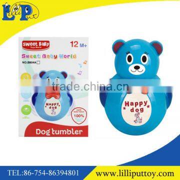 Cartoon dog tumbler toy with light and music