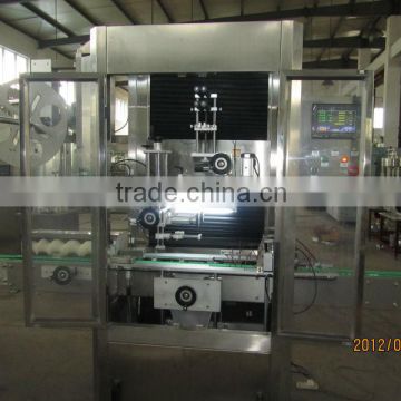 Automatic juice bottle sleeve labeling machine