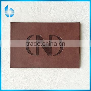 Professionally customize PU leather brand label tag for apparel