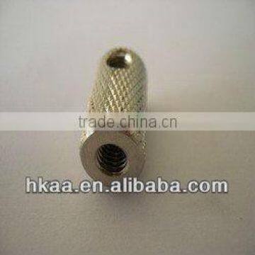 small brass knurled tube