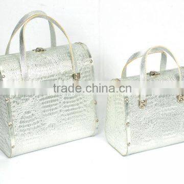 Simple silver alligator handbag artwork