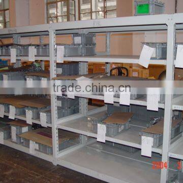 School library long span shelving with steel and wood panel