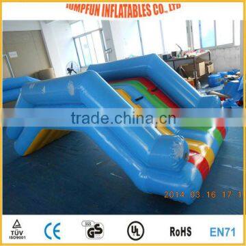 inflatable water slide on the pool