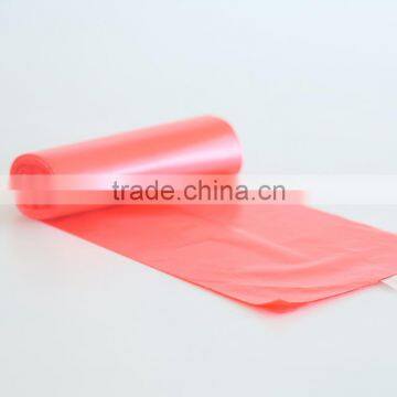 Disposable colored plastic garbage bags on roll