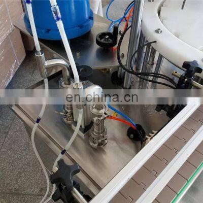 YTK-AFC980 5-50ml 2 Head Automatic Carousel Filling Capping Machine Small Round Bottle Liquid Filling Machine photo-4