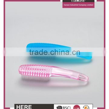 Nail care brush with long plastic transparent handle