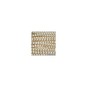 Sell White Near Round Pearl Strands